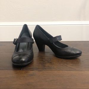 Black leather Mary Janes